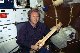 Thomas with small "SoloEtte" guitar. 